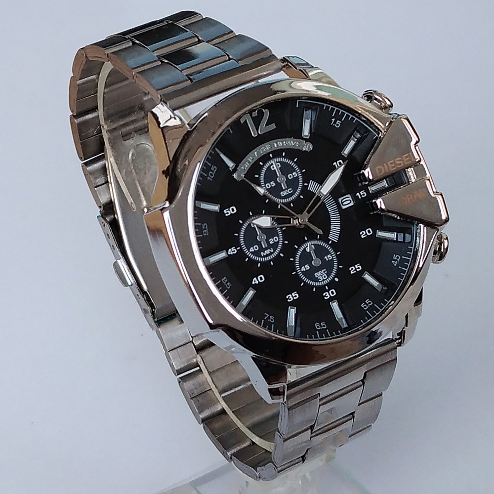 ساعت مچی عقربهای مردانه مدل بند فلزی شاخدار کد 25 NGH ساعت مچی عقربهای مردانه مدل بند فلزی شاخدار کد 25 NGH