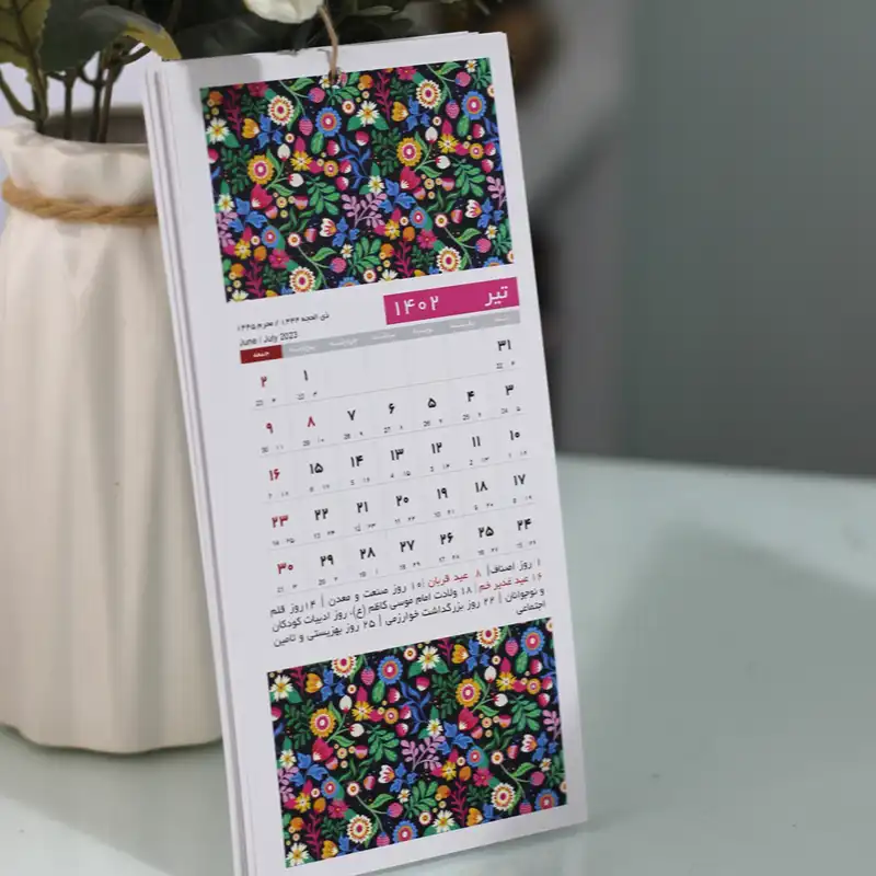 تقویم دیواری سال 1402 طرح گل های باغ