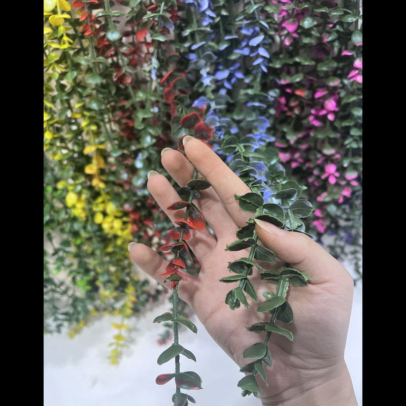 گل مصنوعی مدل آویز شمشاد حلقه‌ای، ابعاد 15×10×65 سانتی‌متر، وزن 150 گرم