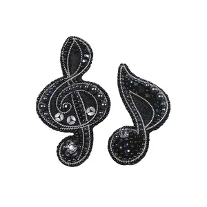 گل سینه زنانه مدل نت موسیقی کد 5014 مجموعه 2 عددی