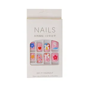 ناخن مصنوعی مدل خالخالی پاپیون و گل و قلب بسته 12 عددی