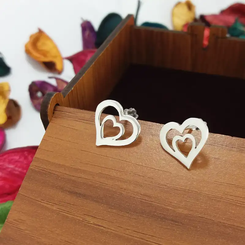 گوشواره نقره زنانه مدل قلب تو در تو