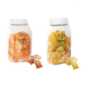  خرما شکلاتی پرتقالی و موزی با مغز بادام دلوکا - ۵۰۰ گرم بسته 2 عددی