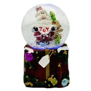 گوی مدل چراغدار بابانوئل طرح دهکده برفی کریسمس کد A4128 Joy