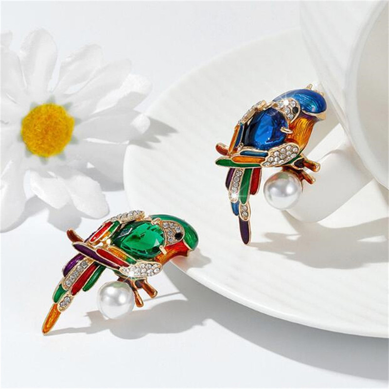 گل سینه زنانه مدل طوطی کد 00925