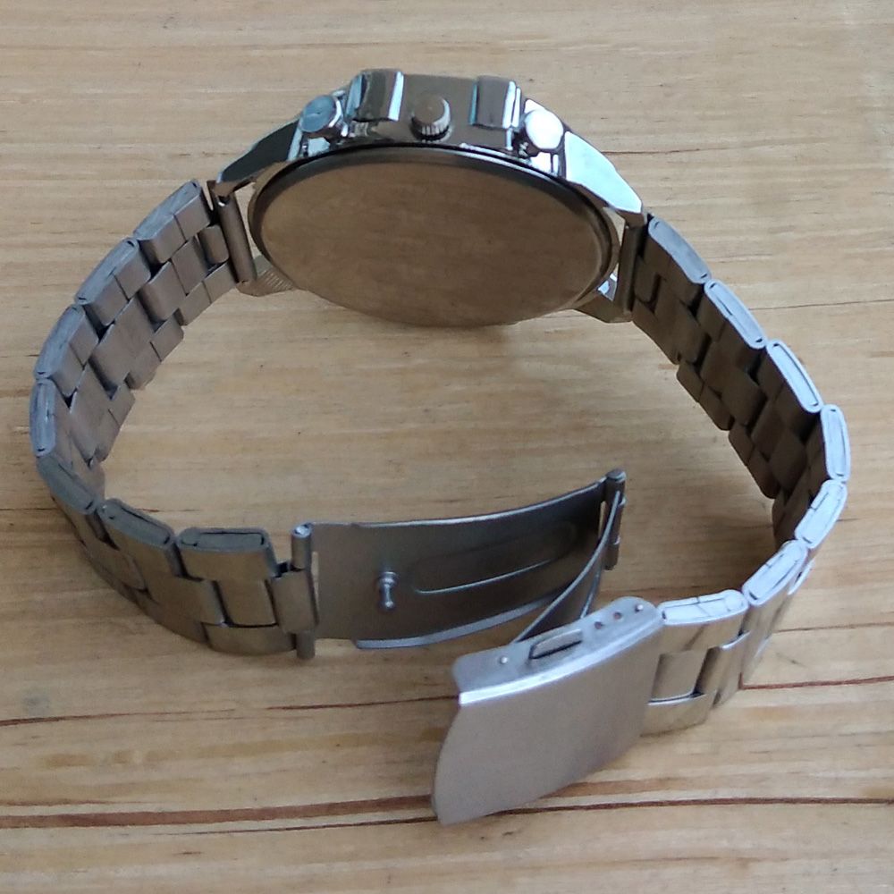 ساعت مچی عقربه‌ای مردانه مدل بند فلزی شاخدار کد 25 NGH -  - 10