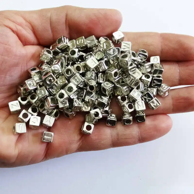 مهره دستبند مدل حروف انگلیسی سیلور کد 1035 بسته 100 عددی