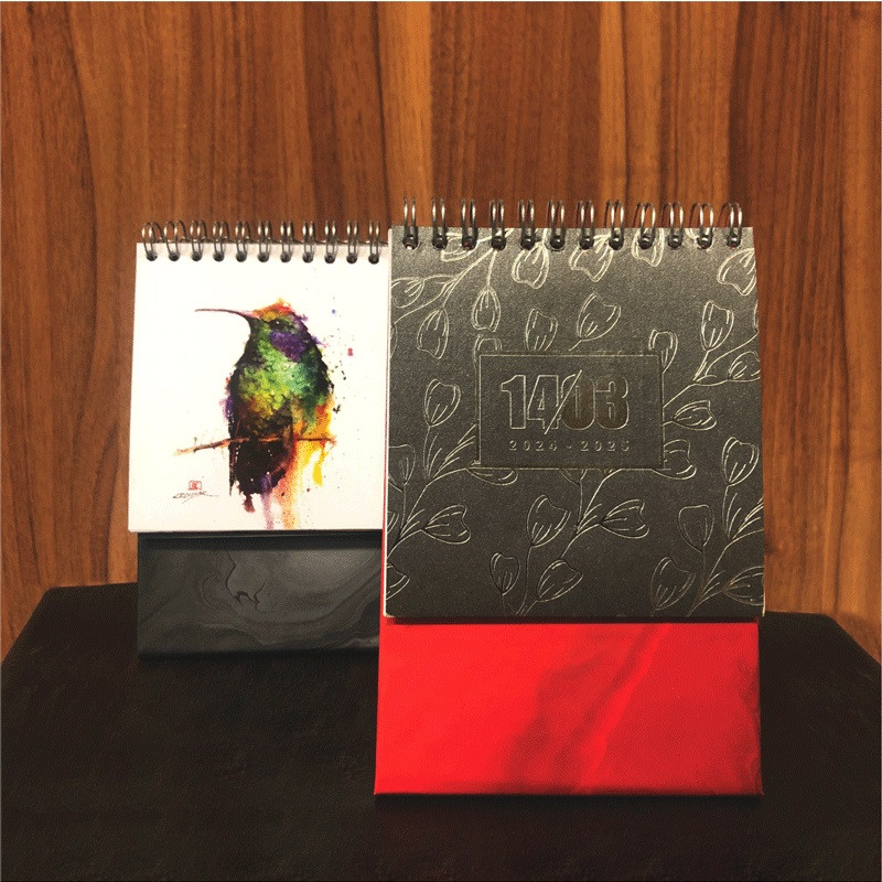 تقویم رومیزی سال 1403 مدل کیوان بسته 12 عددی تقویم رومیزی سال 1403 مدل کیوان بسته 12 عددی