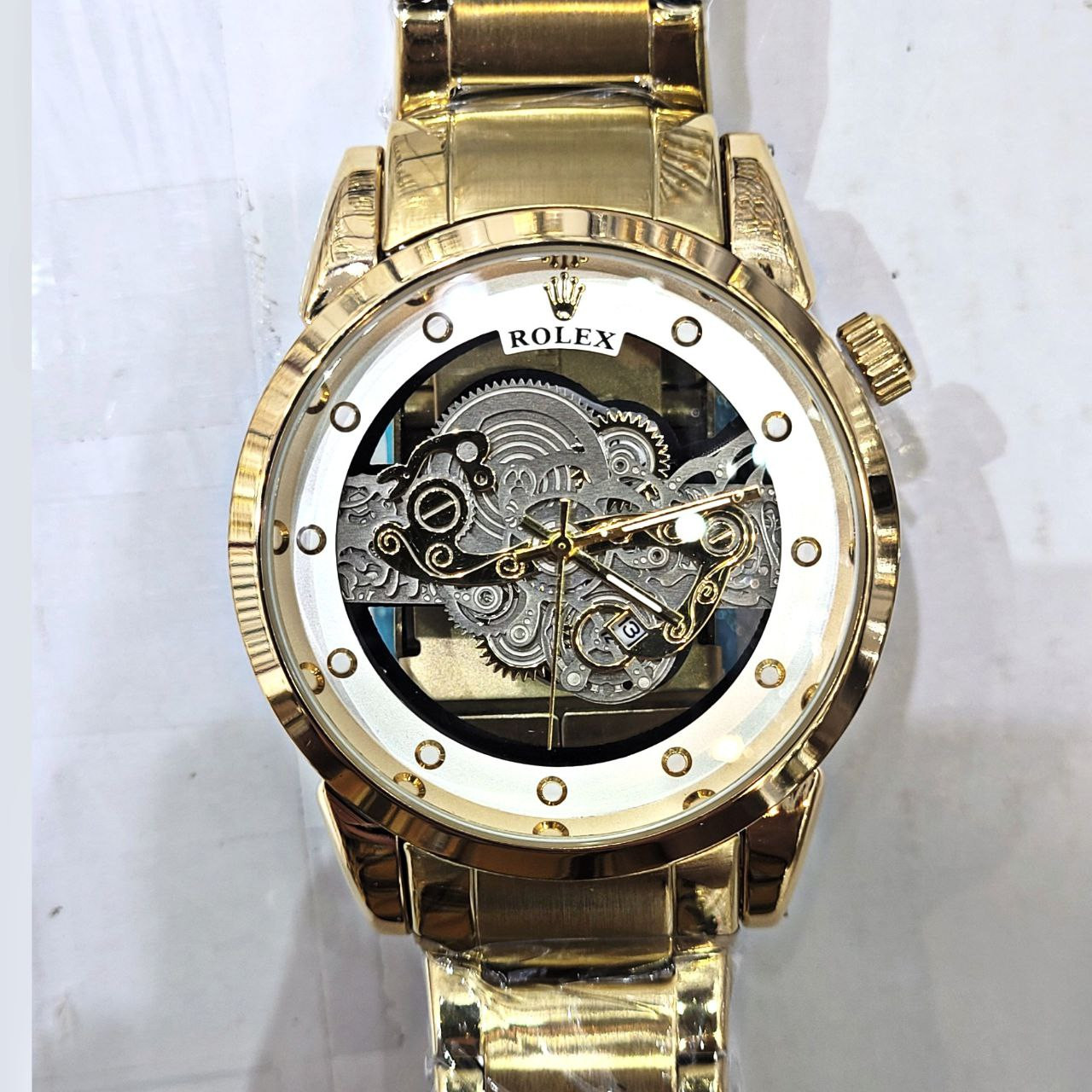 ساعت مچی عقربه‌ای مردانه  مدل پشت شیشه ای موتور پیدا