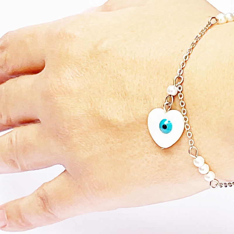 نیم ست زنانه مدل صدف و مروارید طرح چشم زخم