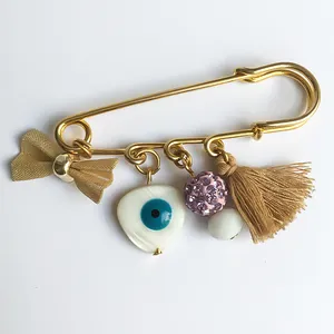 گل سینه زنانه مدل چشم نظر