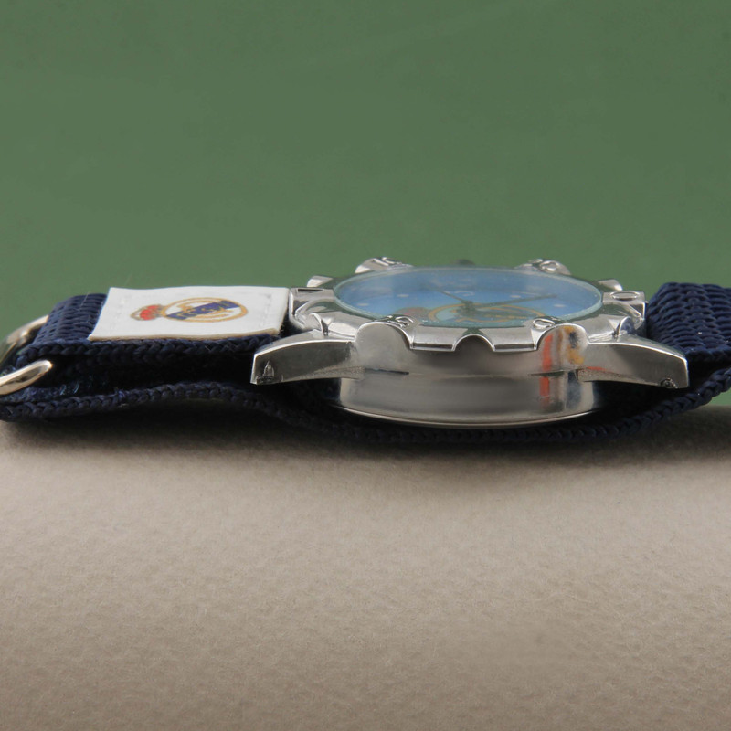 ساعت  مچی عقربه ای پسرانه مدل ورزشی بند کتان چسبی طرح رئال مادرید کد WHK_094