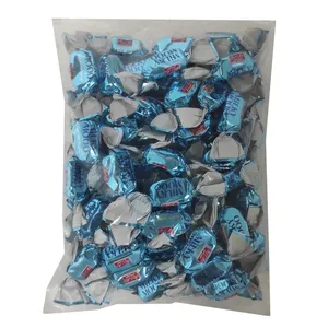 تافی شیری با مغزی کرم نارگیل میلکی مو شیرین عسل - 500 گرم