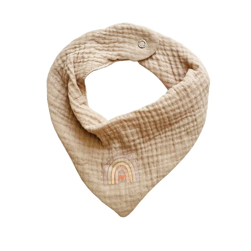 پیش بند نوزادی مدل کابویی طرح رنگین کمان رنگ کرم استخوانی