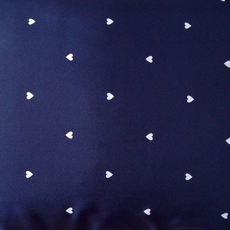 پارچه لباس عرض 1.5 متر مدل ساتن ال ایکس طرح قلبی رنگ سرمه‌ای