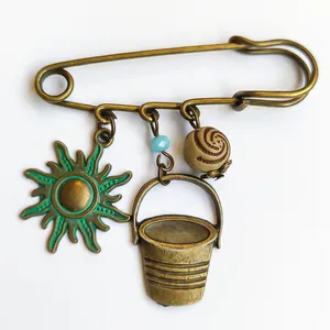 گل سینه زنانه مدل خورشید