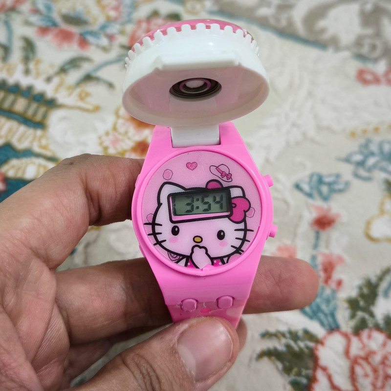 ساعت مچی دیجیتال مدل بند سیلیکونی قاب چرخان طرح هلو کیتی