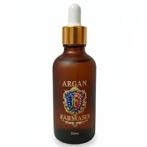 روغن آرگان تقویت‌کننده و درخشان کننده مو فارماسیس مدل 001 مناسب برای انواع مو حجم 50 میلی‌لیتر