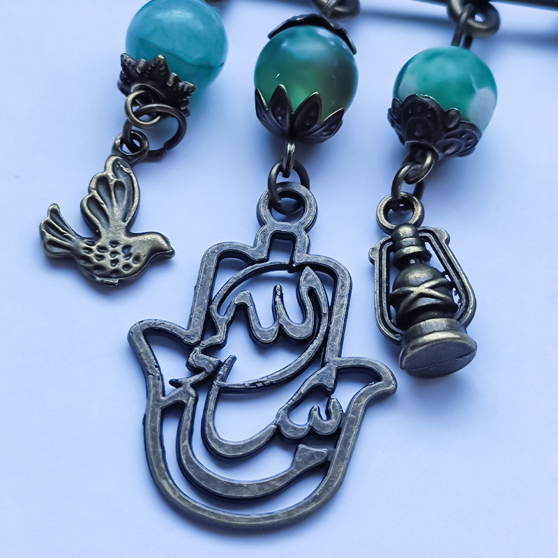 سنجاق سینه زنانه مدل پرنده و فانوس