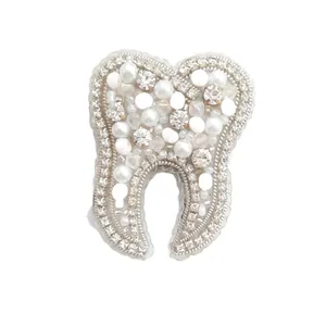 گل سینه زنانە مدل دندونی