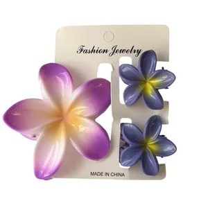  کلیپس مو زنانه مدل گل پلومریا بسته سه عددی