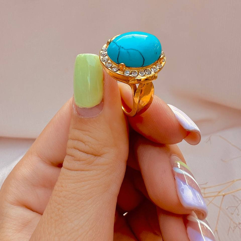 انگشتر زنانه مدل بیضی نگین دار طرح فیروزه انگشتر زنانه مدل بیضی نگین دار طرح فیروزه