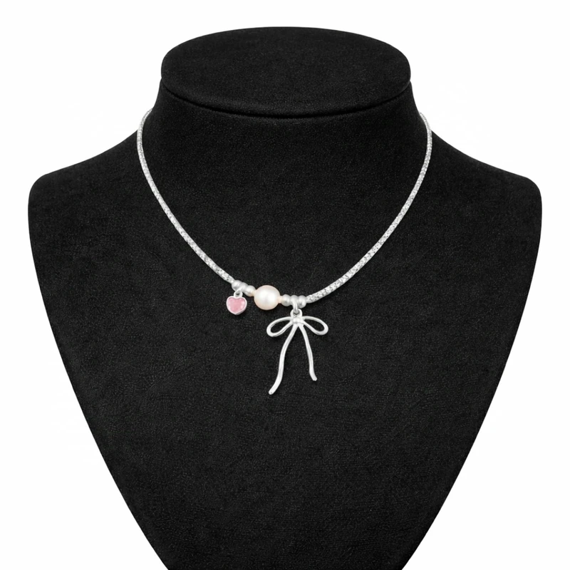 گردنبند زنانه مدل پاپیونی قلب مروارید