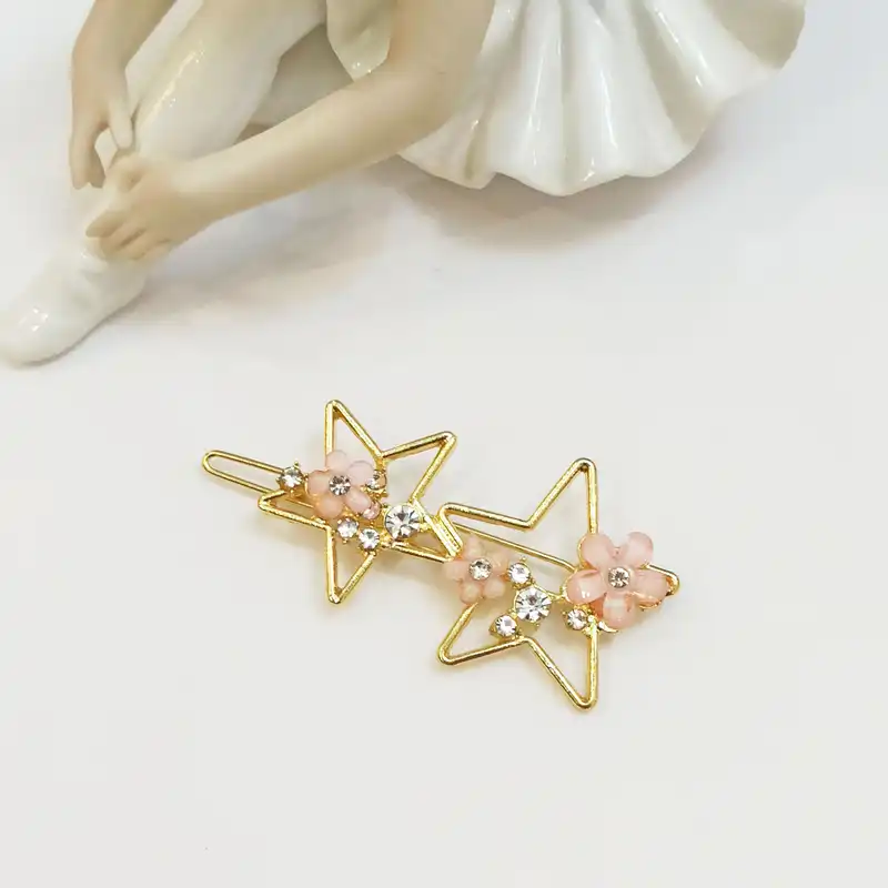 گیره مو زنانه مدل مجلسی فلزی بابونه طرح ستاره دریایی