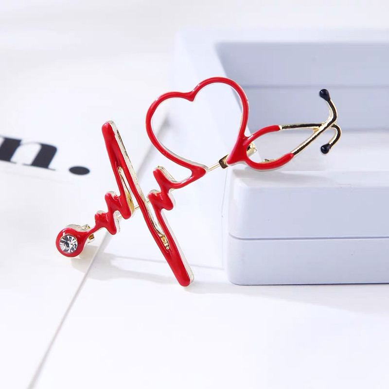 گل سینه زنانه مدل گوشی پزشکی کد 111006 گل سینه زنانه مدل گوشی پزشکی کد 111006