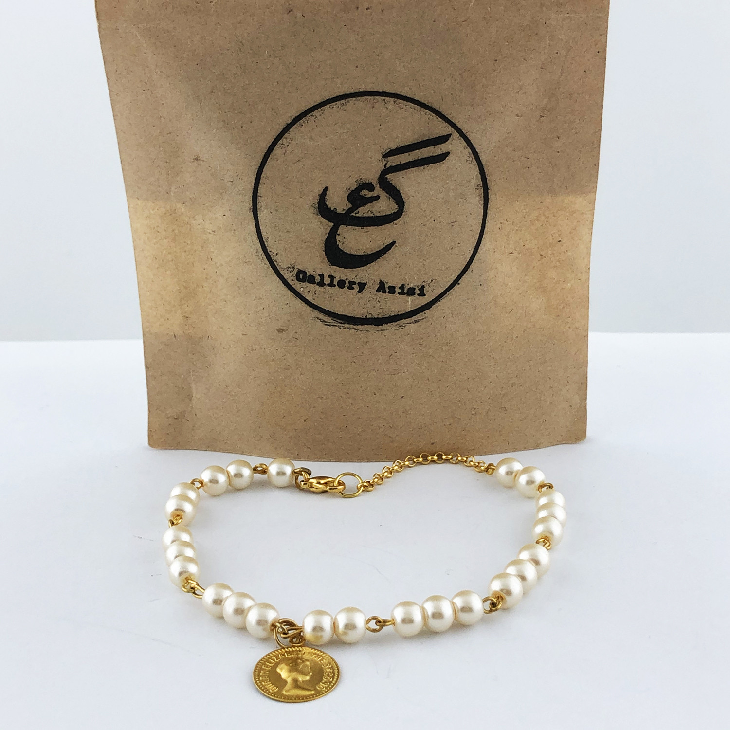 پابند زنانه گالری عزیزی طرح سکه مدل gz99484 پابند زنانه گالری عزیزی طرح سکه مدل gz99484