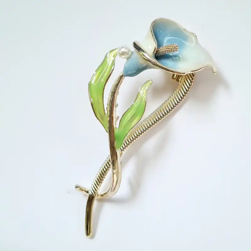 گیره مو زنانه مدل گل شیپوری چفتی کد fengy 222