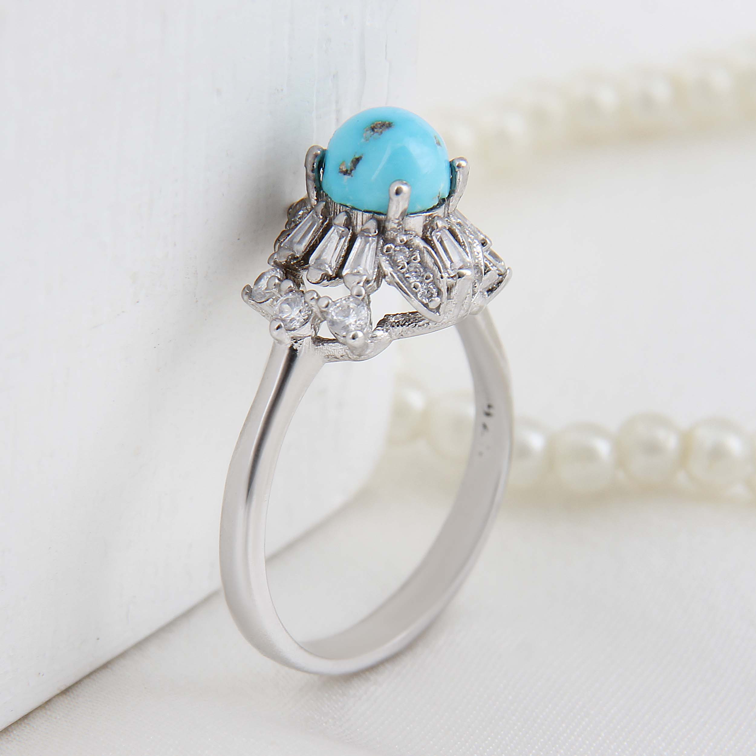 انگشتر نقره زنانه بازرگانی میلادی مدل فیروزه طبیعی نیشابور قالب جواهری ر وکش رادیوم کد AWR-1640