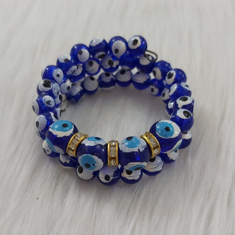 دستبند دخترانه مدل فنری مروارید چشم زخم کد chzkh111