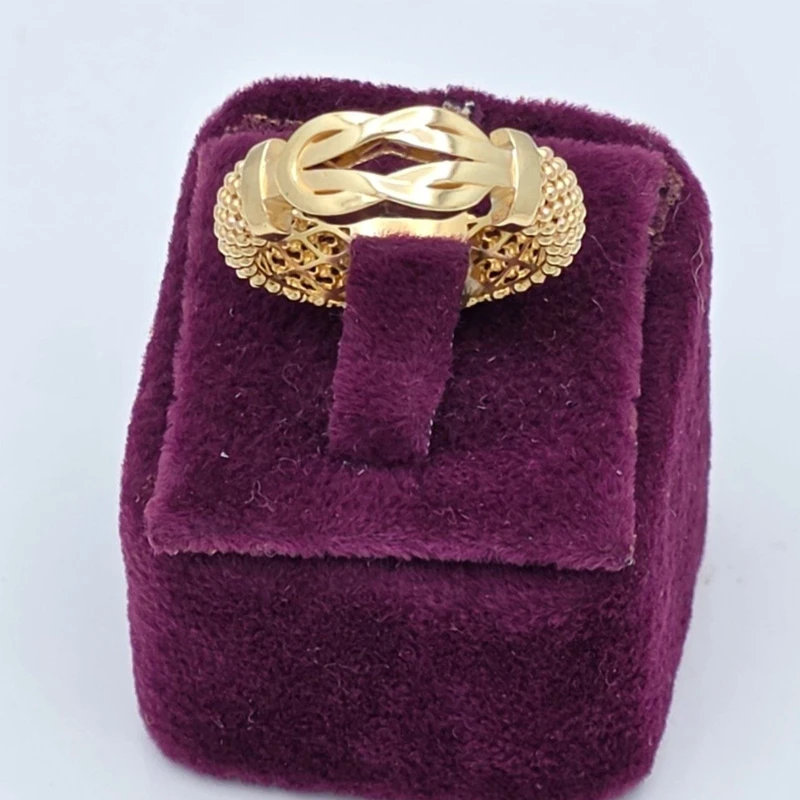 عکس شماره 2 : انگشتر طلا کم اجرت 18 عیار زنانه طلا و شمش برلیان مدل گره عشق سایز 55