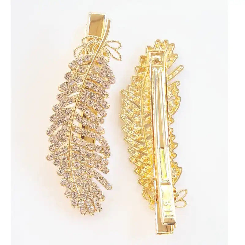 گیره مو زنانه مدل پَر نگین دار پنسی کد 973 brg