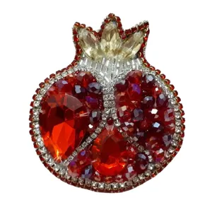 گل سینه زنانه طرح انار