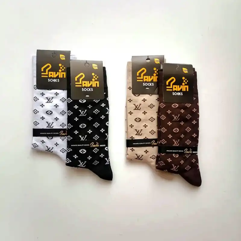 جوراب ساق بلند زنانه پاوین مدل سه ربع مجموعه چهار عددی