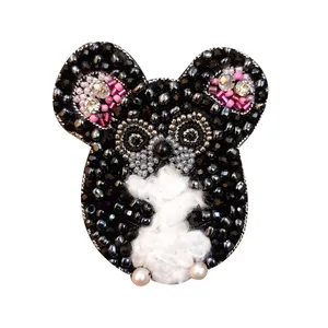 گل سینه زنانه مدل موش