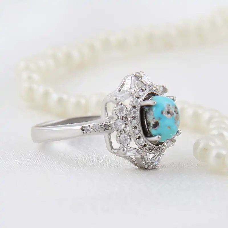 انگشتر نقره زنانه بازرگانی میلادی مدل  فیروزه طبیعی نیشابور قالب جواهری روکش رادیوم کد AWR_1641