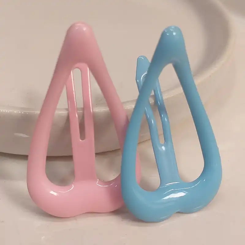 گیره مو زنانه مدل تق تقی قلبی کد kh678 بسته 4 عددی