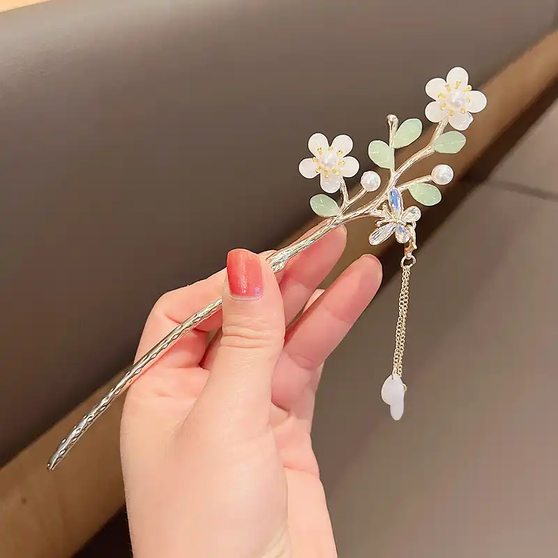 گیره مو زنانه مدل کانزاشی گل ریزان