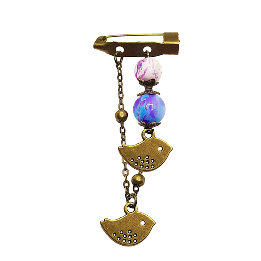 گل سینه زنانه مدل پرنده