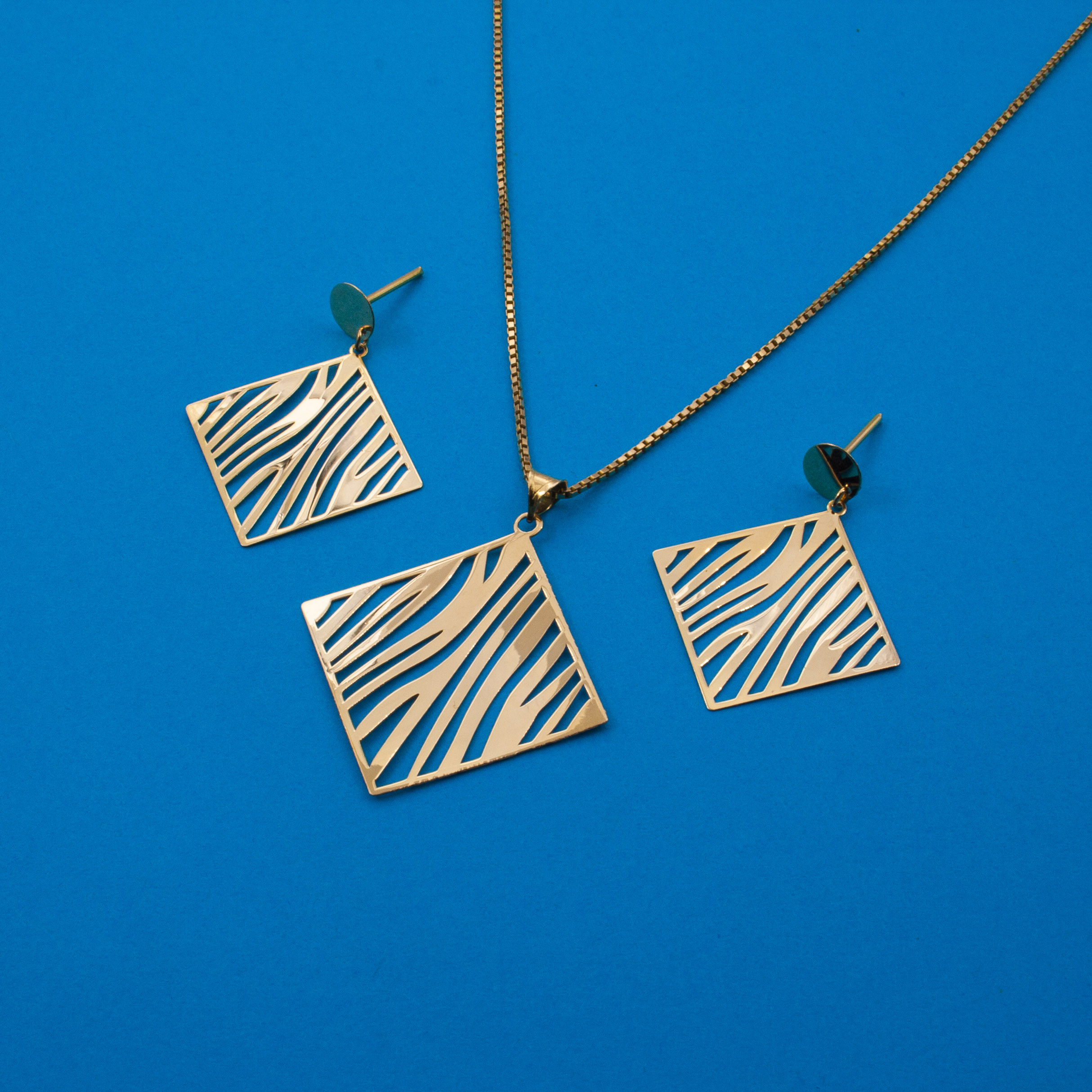 نیم ست طلا 18 عیار زنانه دُرج طرح زبرا مدل DS24