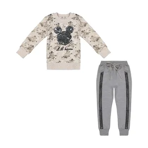 ست سویشرت و شلوار دخترانه مدل پولک برگردان میکی موس رنگ کرم