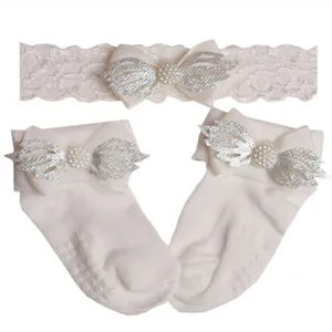 ست هدبند و جوراب نوزاد مدل 12ef