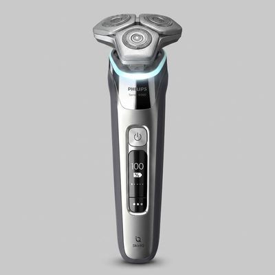 ماشین اصلاح موی صورت فیلیپس مدل S9985 صفرزن چرخشی باتریقابل شارژ ضدآب با تیغه کربن استیل و طراحی ارگونومیک ساخت هلند