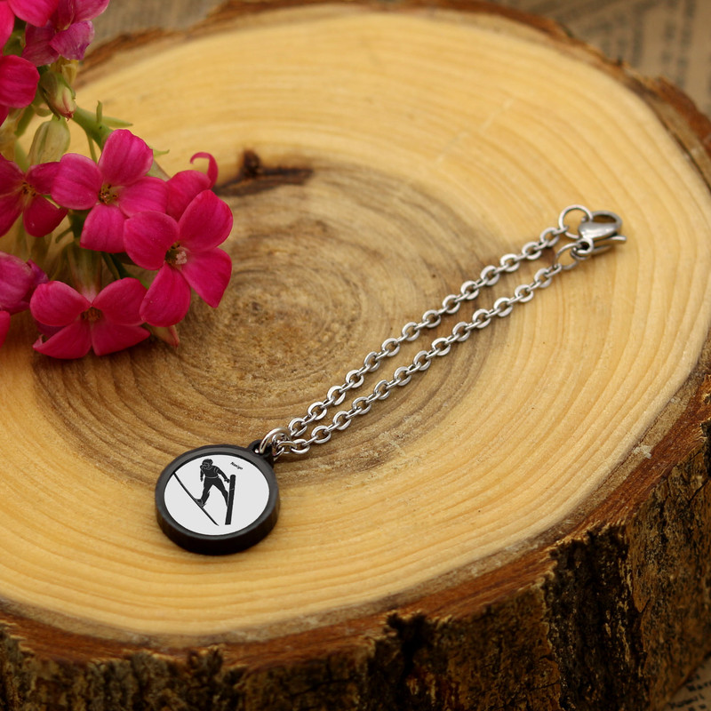 آویز ساعت زنانه ناکسیگو مدل شب تاب طرح اسکی کد AW8947 آویز ساعت زنانه ناکسیگو مدل شب تاب طرح اسکی کد AW8947