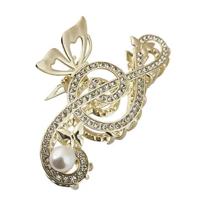 کلیپس مو زنانه مدل مجلسی لوکس طرح کلید سل موسیقی نگین مروارید دار کد 4056