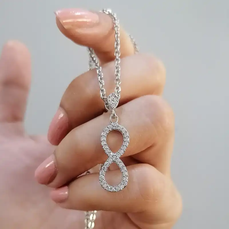 نیم ست نقره زنانه مدل جواهری بینهایت NS9045