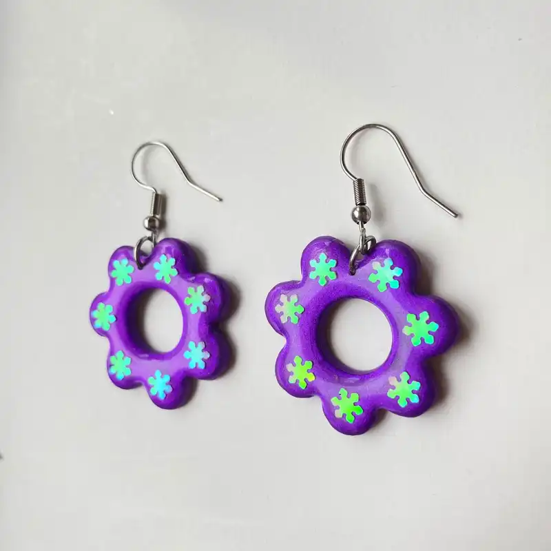 گوشواره زنانه مدل گل کرومی براق